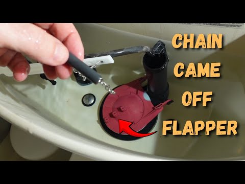 Part of a video titled Toilet Chain Came Off the Flapper - HOW TO FIX IT - YouTube