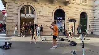 Street performers playing Ed Sheeran Perfect on electric violin and double bass  in Rome