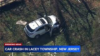 Car crashes through backyard fence in Lacey Township, NJ