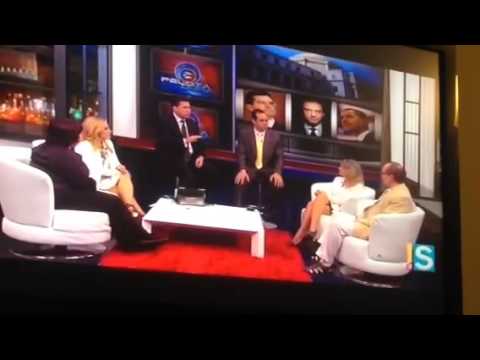 Brenda Reyes being interviewed on Jugando Pelota Dura.