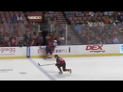 Dimitri Kulikov drills Alexei Ponikarovsky