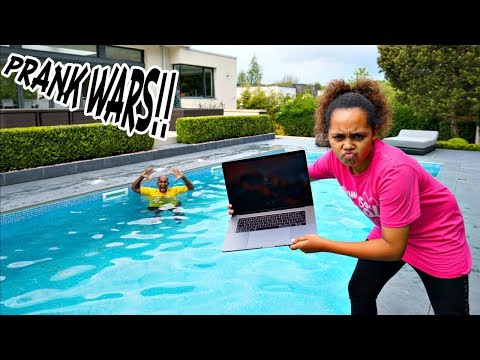 MY DAD'S MACBOOK PRO IN OUR SWIMMING POOL PRANK!!