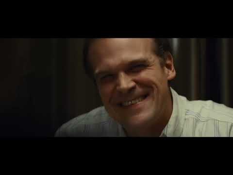 Night exterior in the trailer where strings and organ hang like fog over Boston streets