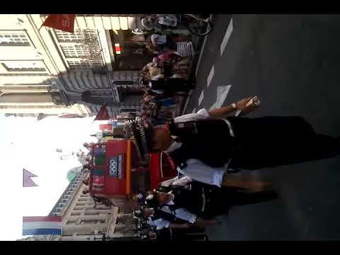 Police overkill on Regent Street, behind Olympic torch, 2012
