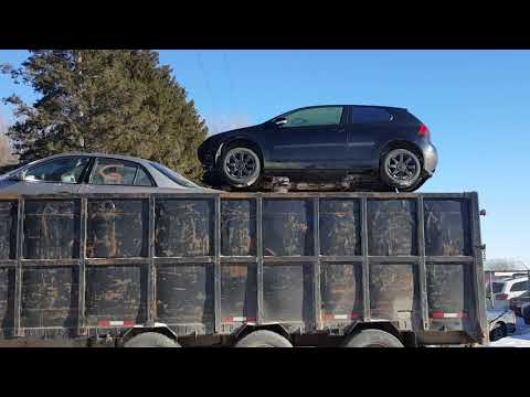 Thumbnail for Watching the scrapper load a VW rabbit into the scrap trailer