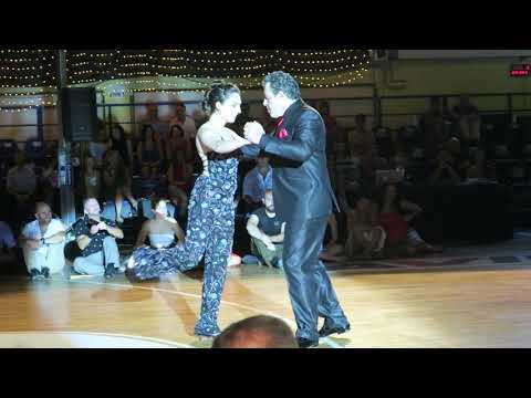  Fabian Salas  and  Lola Diaz  are  dancing  to  a  nontraditional song  at  A los amigos tango festival  in  2019