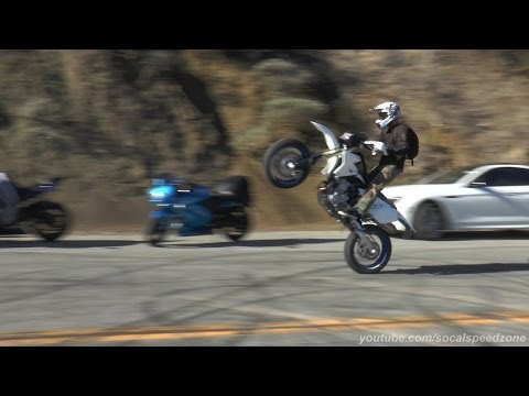 Motorcycle flybys and wheelies at the Lookout on Mulholland