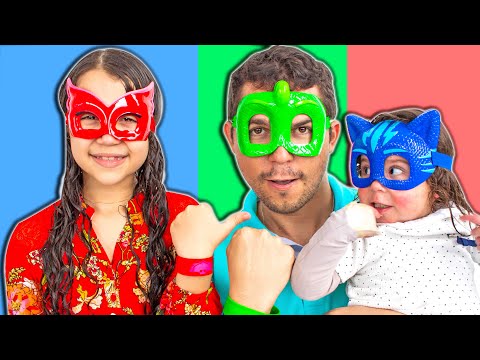 SARAH pretends to play with Superhero Daddy and ELOAH