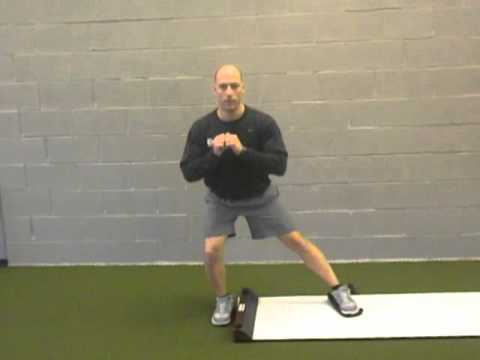 Standing hip adduction on slide board