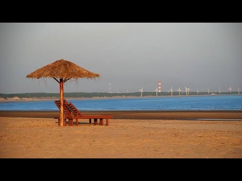 Riding a bike on Mandvi beach,  Mandvi, Kutch, Gujarat
