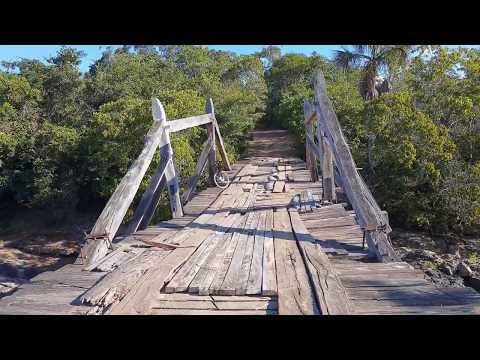 Wooden bridge over the Coxim River | Border between the municipalities of Rio Verde and São Gabri...