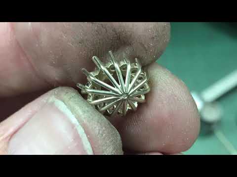 Sapphire and diamond cluster engagement ring