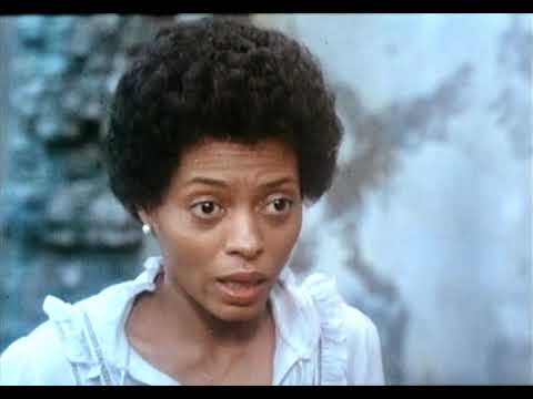 Trailer end card over skyline: a final swell before the ‘Home’ coda