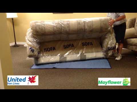 Part of a video titled Highland Moving: How to Blanket Wrap a Sofa - YouTube
