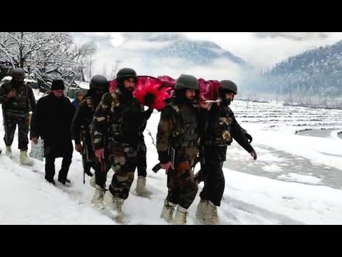 Army Personnel Carry Pregnant Lady On Stretcher Amid Snowfall, Provide Ambulance