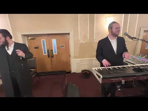 Motty Breier on keys & sruly Altmen singer second dance