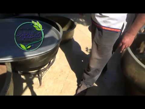 تجهيز وجبات طعام في حرستا في ريف دمشق من قبل المكتب الإغاثي الموحد في الغوطة الشرقية