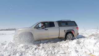 Blizzard Snow Bank vs Truck