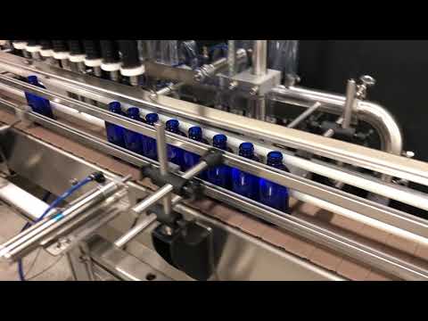 Overflow filler test - glass bottles - 4 oz