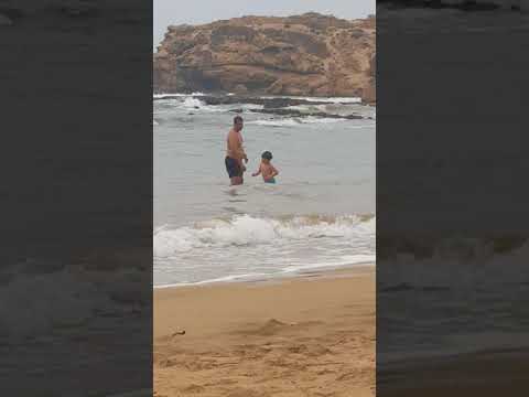 Zayd with daddy at the beach