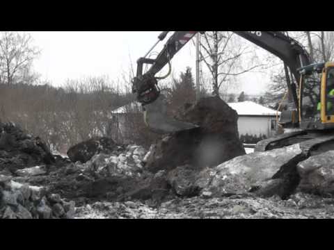 Excavator, Volvo breaking frosen ground