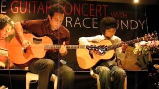 Trace Bundy & Sungha Jung playing Canon on Acoustic Guitar Trace Bundy & Sungha Jung playing Canon on Acoustic Guitar