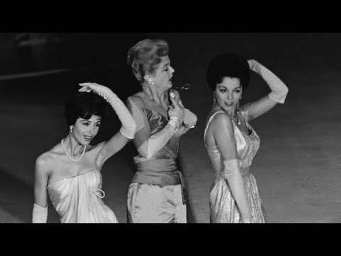 , title : 'Angela Lansbury, Joan Collins and Dana Wynter performing at the Oscars®'