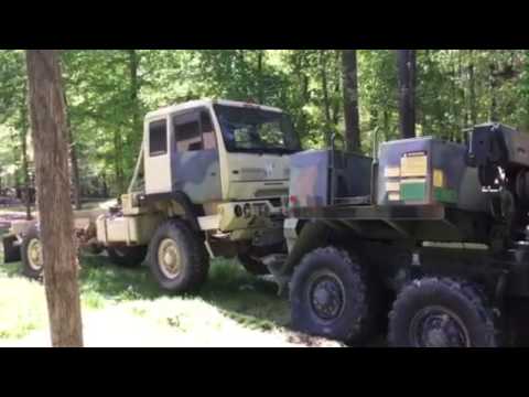 M1089 moving LMTV parts truck.