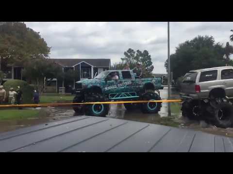 Rednecks In Houston TX Use Monster Truck To Pull A Military Truck From Deep Water