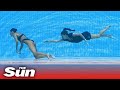 Pelatih menyelamatkan perenang AS yang PINGSAN di bawah air dan hampir tenggelam