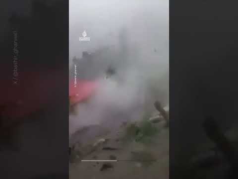 Moment terrifying floodwaters sweep through Afghan village