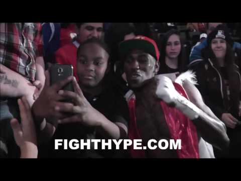 ROBERT EASTER CELEBRATES WITH FANS IMMEDIATELY AFTER DEFEATING LUIS CRUZ; A PEOPLE'S CHAMP