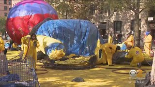 Crowds gather for Macy's Thanksgiving Day Parade balloon inflation