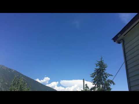 Q400 flying over Nelson, BC.