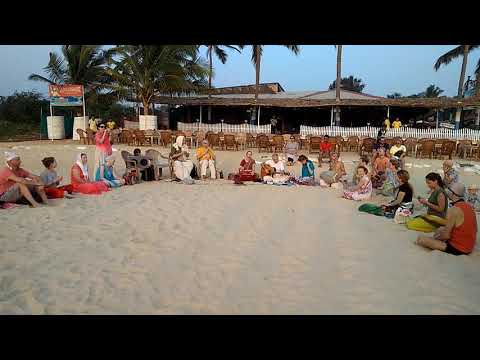 Foreigners Doing the bhajan in Goa colva beach