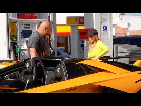 Sarkis picking up a girl with a very Loud Lamborghini SVJ.