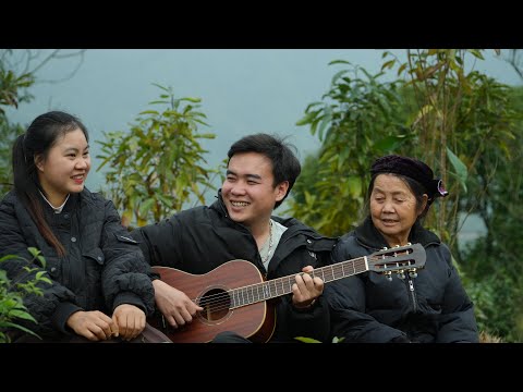 A joyful reunion filled with Phu's singing and guitar playing on the windy hilltop