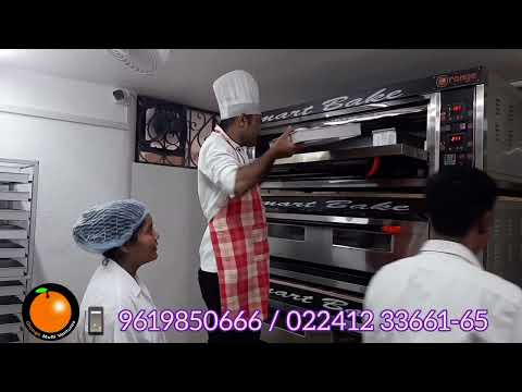 Orange automatic gas baking oven, for bakery, capacity: 100-...