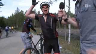 Cyclist Cramps When Reporter Interviews Him