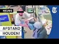 Bizarre coronaruzie in supermarkt gefilmd