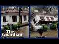 India: floodwaters sweep away house in Kerala