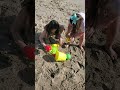Kids Are Playing On The Beach With Sand And Having Lots Of Fun 1st Beach Day Of 2023
