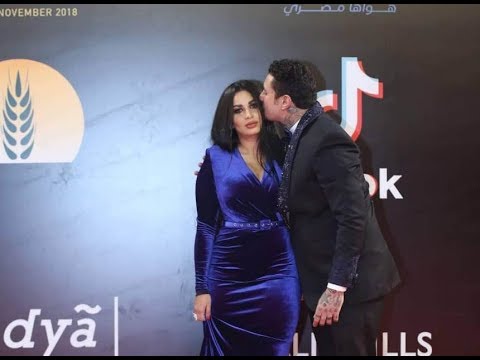 قبلة ساخنة من أحمد الفيشاوي لزوجته بمهرجان القاهرة السنيمائي