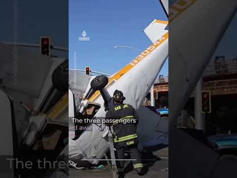 Moment plane crashes on a busy highway in the US