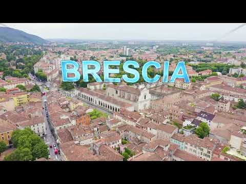 Inscription on video. Brescia, Italy. Sant Afra, Brescia. Arnaldo Square. Arises from blue water, Ae