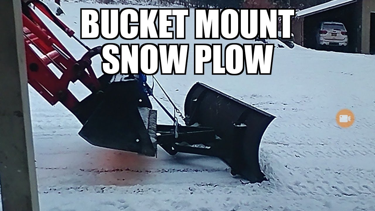 kioti tractor loader bucket mount show plow and snowblower.