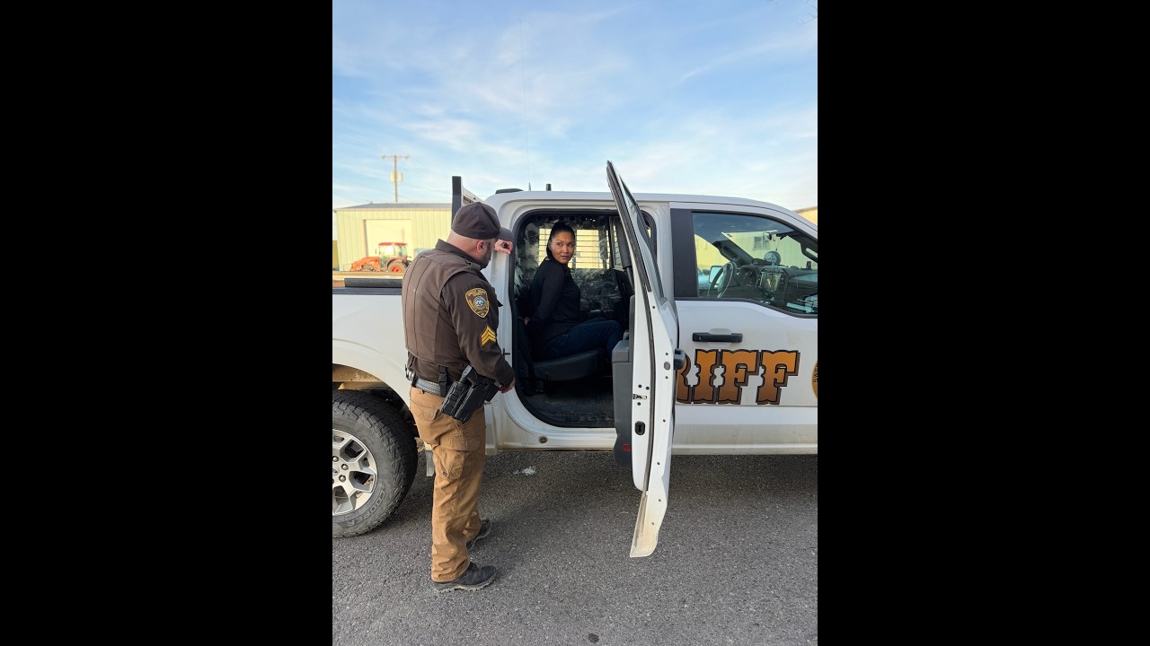 Lynette gets forced out of the police car when she doesn’t want to get out