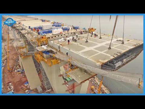 Modern Suspension Bridge & Asphalt Road Construction Technology. Construction Equipment Machines