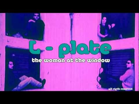 L-PLATE / The woman at the window