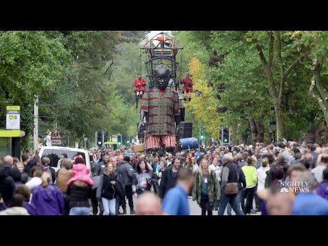 Giant Marionettes Roam The Streets Of Liverpool, Enthralling Onlookers | NBC Nightly News